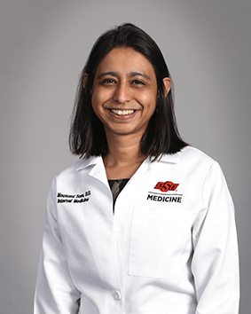 Mousumi Som, DO., FACOI.