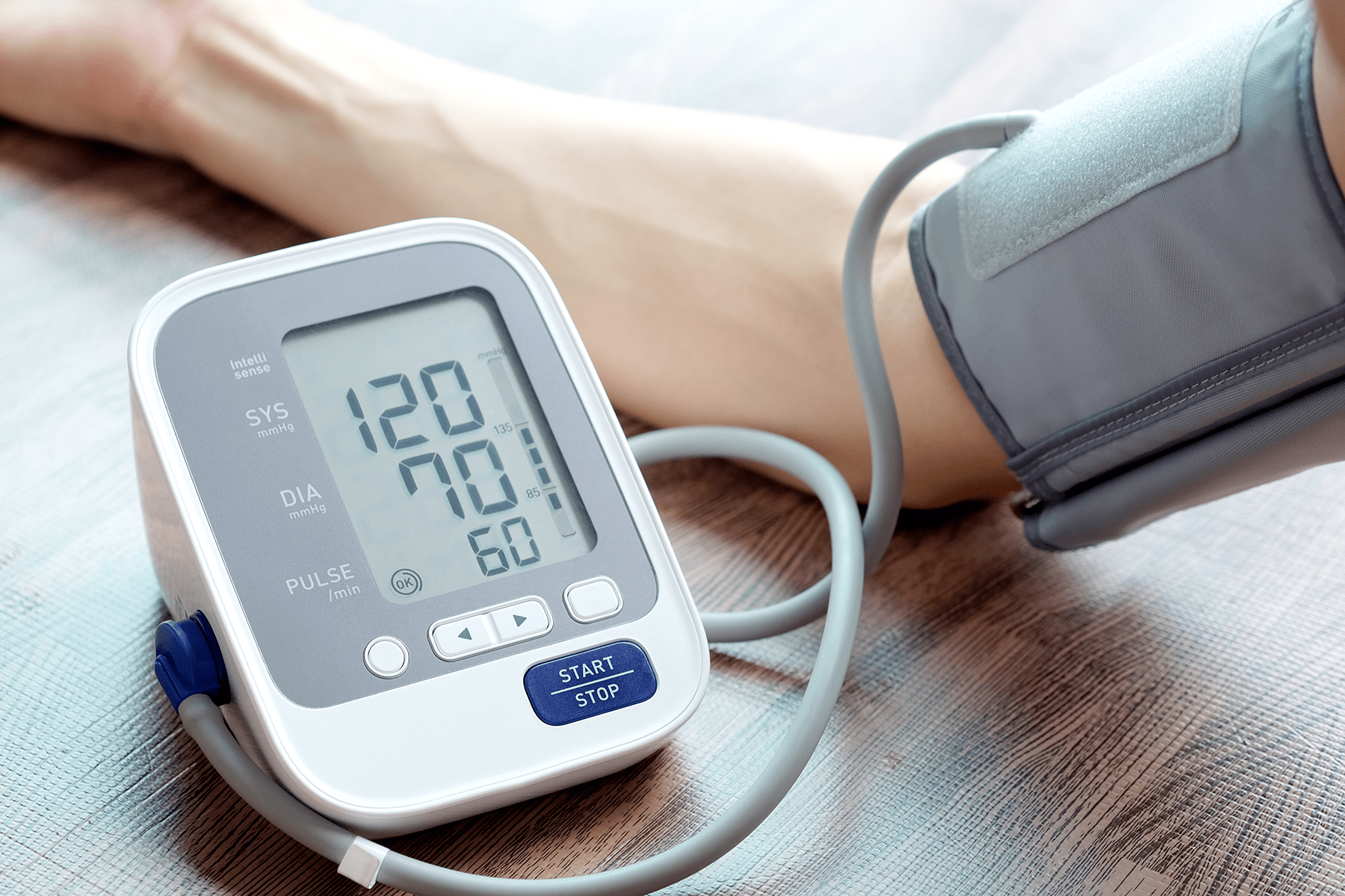 high-blood-pressure Arm with high blood pressure checker device.