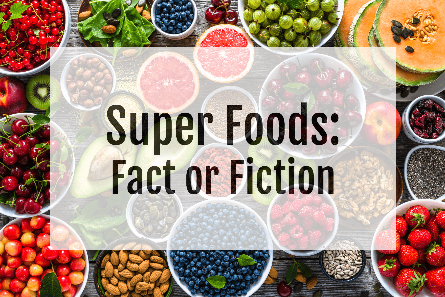A bright variety of natural foods with a text overlay that reads: "Super foods: fact or fiction."