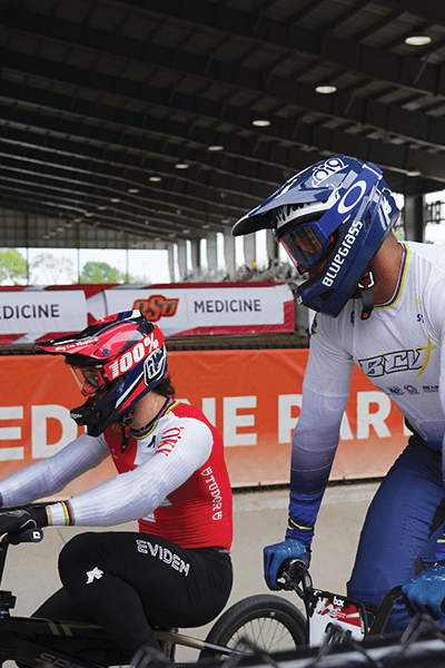 bmx-tulsa-v1 Two BMX riders in helmets on their bikes.